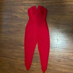 A woman’s red jumpsuit
